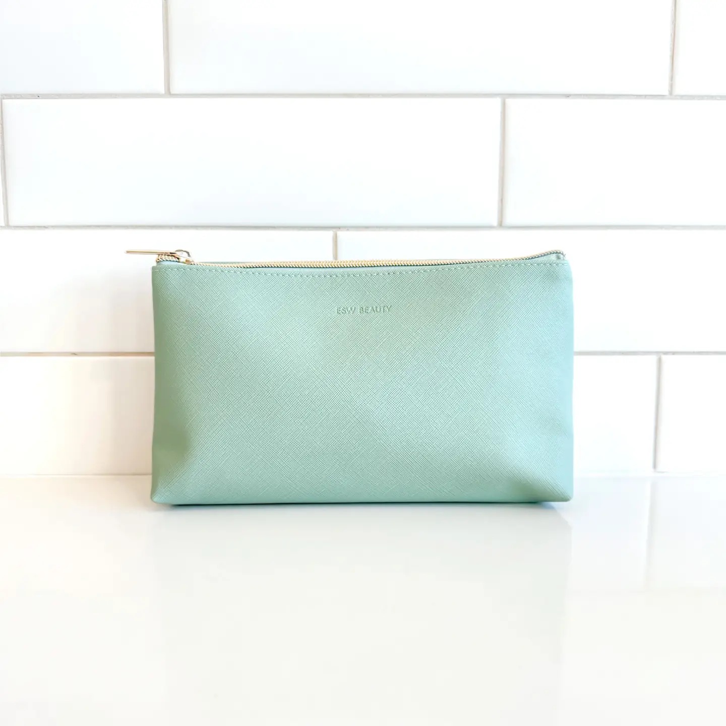 green zipper pouch